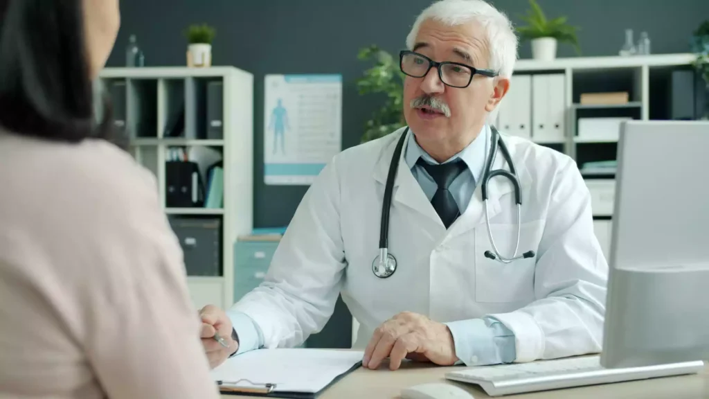 Homeopathic doctor treating skin disease patient in Pakistan