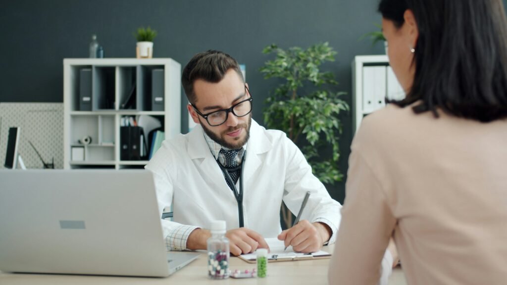 Homeopathic doctor consultation with patient