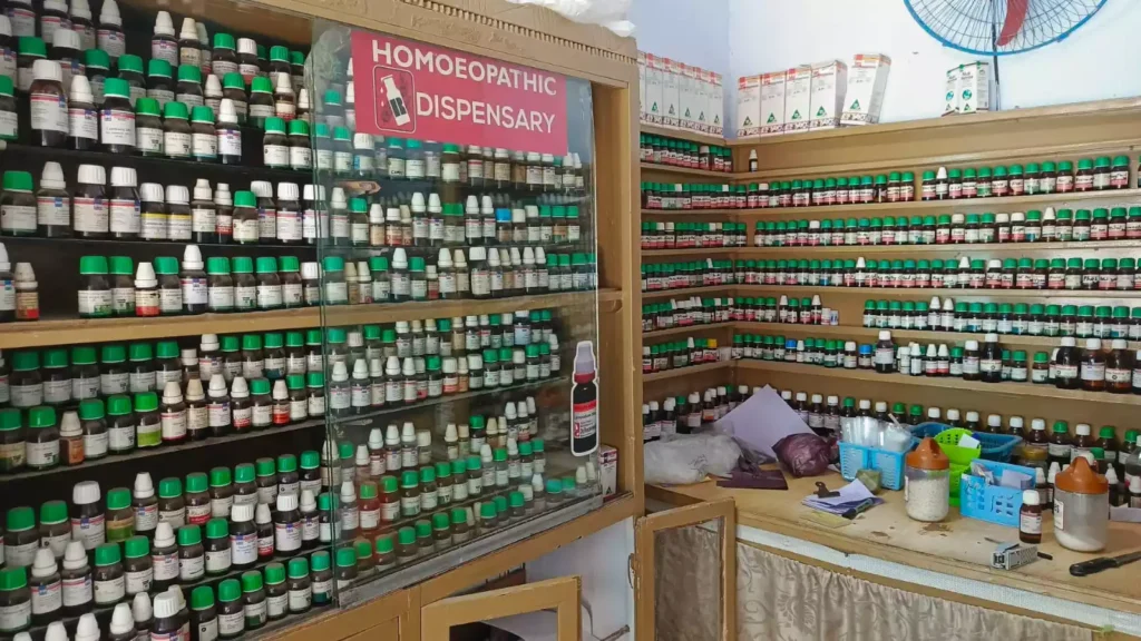 Homeopathic medicine bottles and natural remedies at Sirajia Clinic